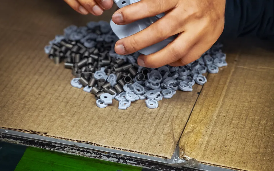Hand assembly of plastic parts